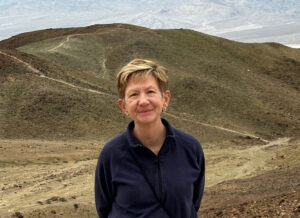 Veda Kanitz standing in front of Death Valley landscape.